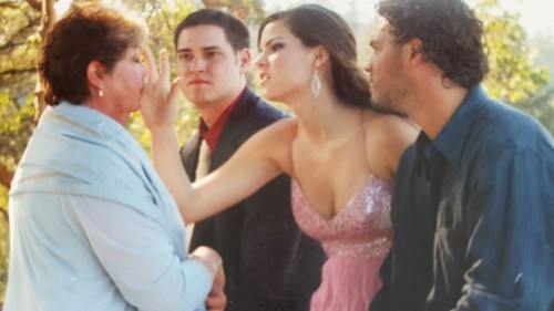 Julie, and three of her four children on her 25th wedding anniversary, not long before she moved to Hawaii.